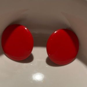 Red metal button pierced earrings